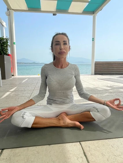 Morning yoga at a renowned lido in front of Lake Garda 5