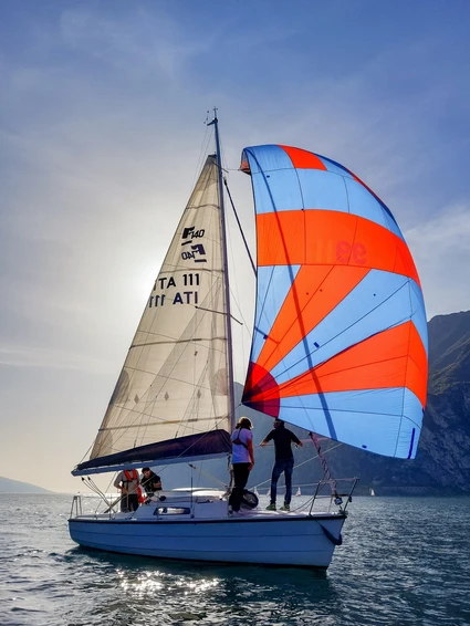 Sailing boat trip with skipper and sunset aperitif from Riva del Garda 10