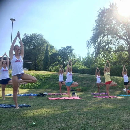 Yoga group lesson outdoors with a view on Lake Garda 4