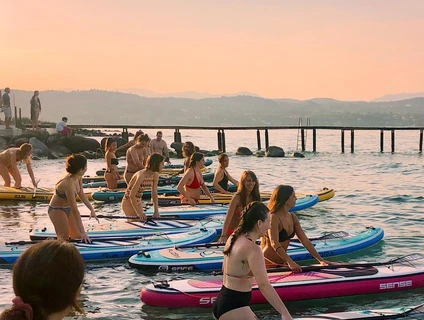 Experience SUP in Desenzano del Garda during sunset 1