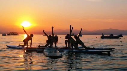 Morgen- und Sonnenuntergang-SUP-Yoga in Bardolino am Gardasee 0